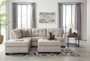 Ashley Furniture Mahoney living room set with sofa, loveseat, and coffee table arranged in a modern living space.