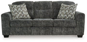 Ashley Furniture Lonoke living room set with sofa and armchair, featuring plush cushions and modern design.