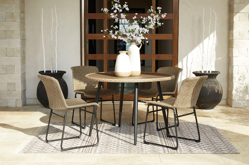 Outdoor dining set by Ashley Furniture featuring a table and chairs, perfect for outdoor meals and gatherings.