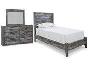 Ashley Furniture Baystorm youth bedroom set with matching bed frame, dresser, and nightstand in a modern bedroom scene.