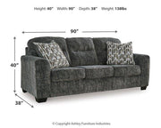 Ashley Furniture Lonoke living room set with sofa and armchair in neutral fabric, modern design, and plush cushions.
