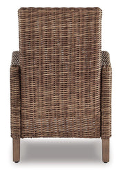 Set of two Ashley Furniture Beachcroft outdoor arm chairs with cushions, stylish outdoor dining chairs for patio relaxation.
