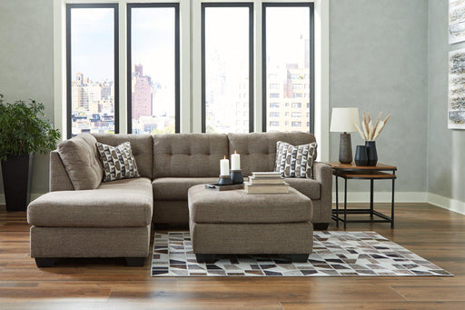 Ashley Furniture Mahoney living room set with sofa and armchair, showcasing modern upholstery and stylish design in a cozy living space.