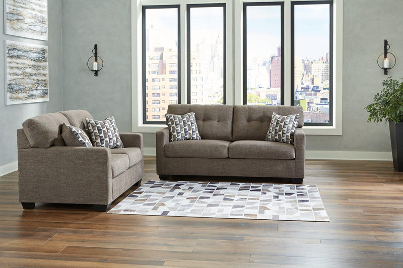 Ashley Furniture Mahoney living room set with sofa and loveseat, featuring plush cushions and modern design in a stylish living space.