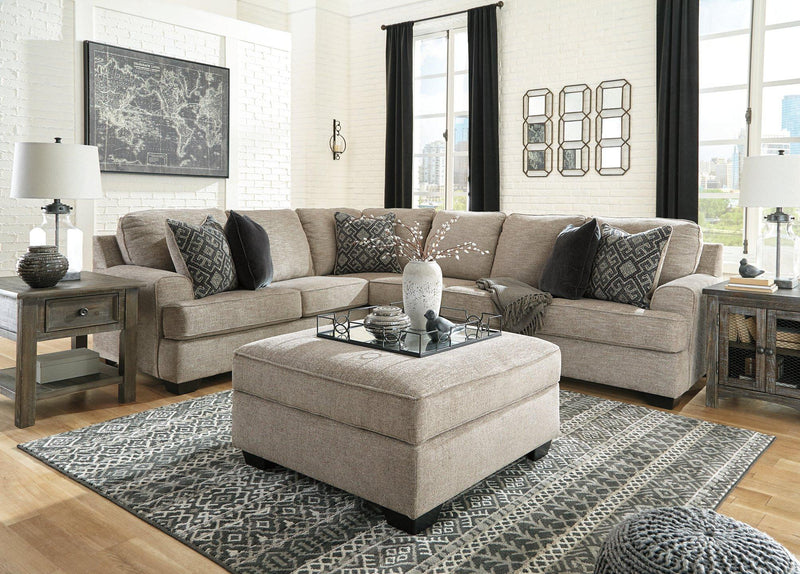Ashley Furniture Bovarian living room set with sofa and armchairs, featuring neutral upholstery and modern design.
