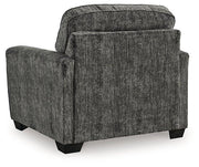 Ashley Furniture Lonoke Living Room Set with sofa and loveseat in a modern design, featuring neutral upholstery and wooden legs.