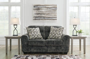 Ashley Furniture Lonoke Living Room Set with a sofa and armchair, featuring neutral upholstery and modern design.