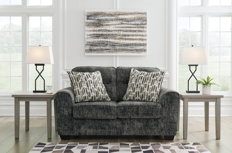 Ashley Furniture Lonoke Living Room Set with a sofa and armchair, featuring neutral upholstery and modern design.