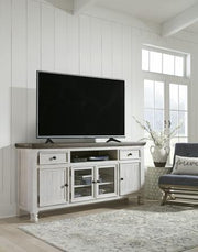 Ashley Furniture Havalance TV Stand with open shelves and storage compartments for modern living room decor.