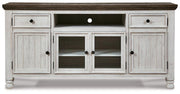 Ashley Furniture Havalance TV Stand with open shelves and storage compartments, crafted from dark wood for a modern living room look.