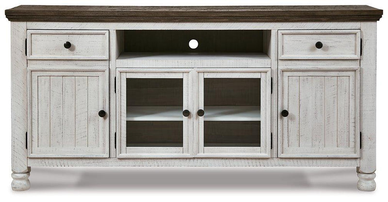 Ashley Furniture Havalance TV Stand with open shelves and storage compartments, crafted from dark wood for a modern living room look.