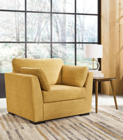 Ashley Furniture Keerwick living room set featuring a sofa and armchairs with neutral upholstery and wooden accents.