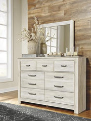 Ashley Bellaby dresser and mirror set featuring a sleek wooden dresser with a matching framed mirror.