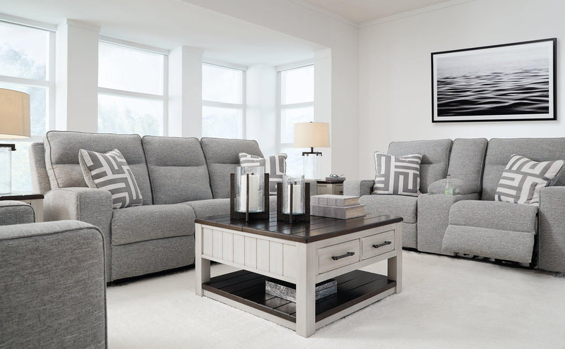 Ashley Biscoe living room set with sofa and armchair, featuring plush cushions and modern design for comfortable home seating.