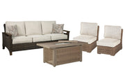 Outdoor dining set by Ashley Furniture featuring Beachcroft lounge chairs, sofa, and fire pit for outdoor entertainment.