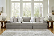 Ashley Furniture Avaliyah Sectional Sofa with plush cushions and modern design, shown in a spacious living room setting
