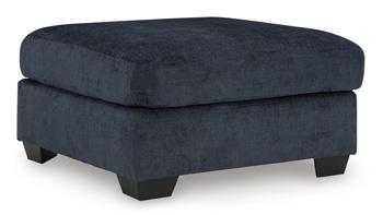 Ashley Furniture Aviemore oversized accent ottoman with plush fabric and sturdy wooden legs, ideal for living room decor.