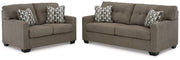 Ashley Furniture Mahoney living room set with sofa, armchair, and coffee table in a modern living space.