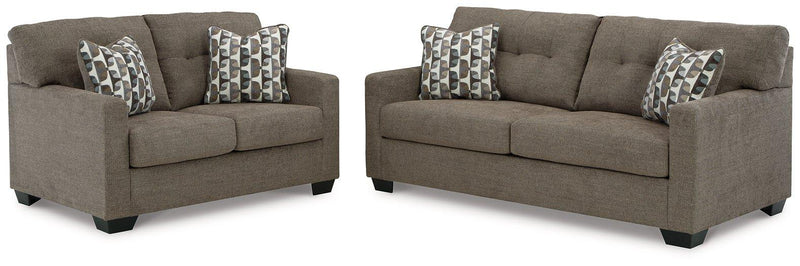 Ashley Furniture Mahoney living room set with sofa, armchair, and coffee table in a modern living space.