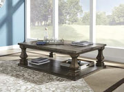 Ashley Furniture Johnelle Occasional Table Set showing two elegant wooden tables with metal accents and a modern design.