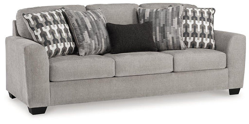 Ashley Furniture Avenal Park sofa with plush cushions and neutral upholstery, shown in a cozy living room setting.