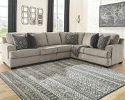 Ashley Furniture Bovarian living room set with sofa and armchairs, featuring neutral upholstery and wooden legs.