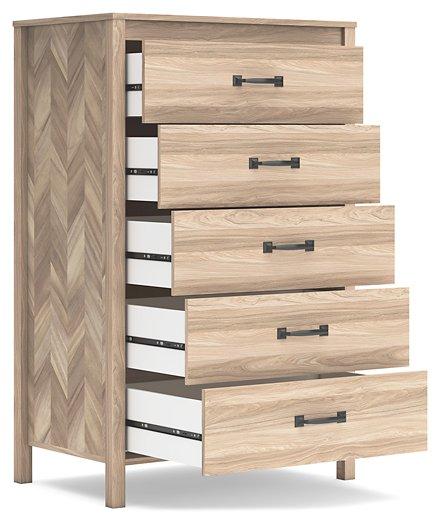 Ashley Furniture Battelle chest of drawers showing a modern wooden storage chest with multiple drawers and sleek design.