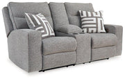 Ashley Furniture Biscoe Living Room Set featuring a sofa, loveseat, and armchair with neutral upholstery and modern design.