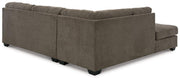 Ashley Furniture Mahoney living room set with plush upholstered sofa and matching chairs in a modern design.
