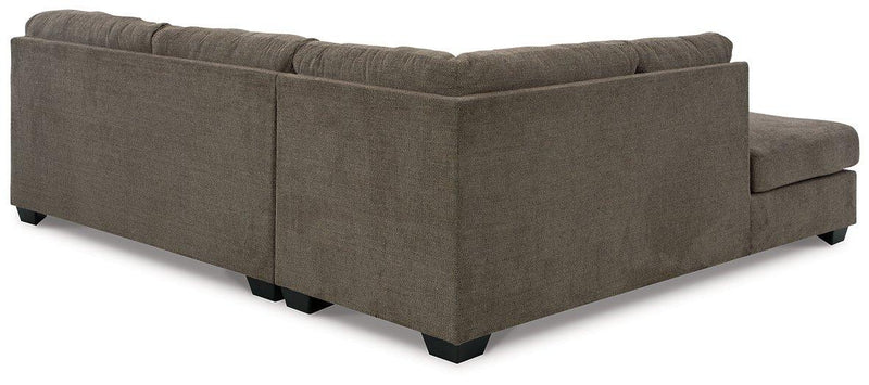 Ashley Furniture Mahoney living room set with plush upholstered sofa and matching chairs in a modern design.