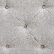 Ashley Furniture Briarson storage bench with cushioned seat and wooden legs, ideal for entryway or living room storage.