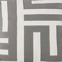 Ashley Furniture Biscoe living room set with a plush sofa and matching armchair in a cozy, modern living space.