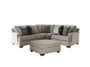 Ashley Furniture Bovarian living room set with sofa and armchairs, featuring neutral upholstery and wooden legs.