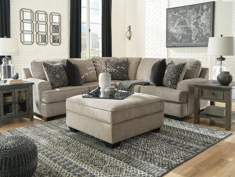 Ashley Bovarian Living Room Set featuring a sofa, loveseat, and armchair with neutral fabric and modern design.