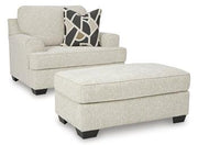Ashley Furniture Heartcort Living Room Set with sofa and loveseat, featuring plush cushions and coordinated upholstery.