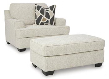 Ashley Furniture Heartcort Living Room Set with sofa and loveseat, featuring plush cushions and coordinated upholstery.
