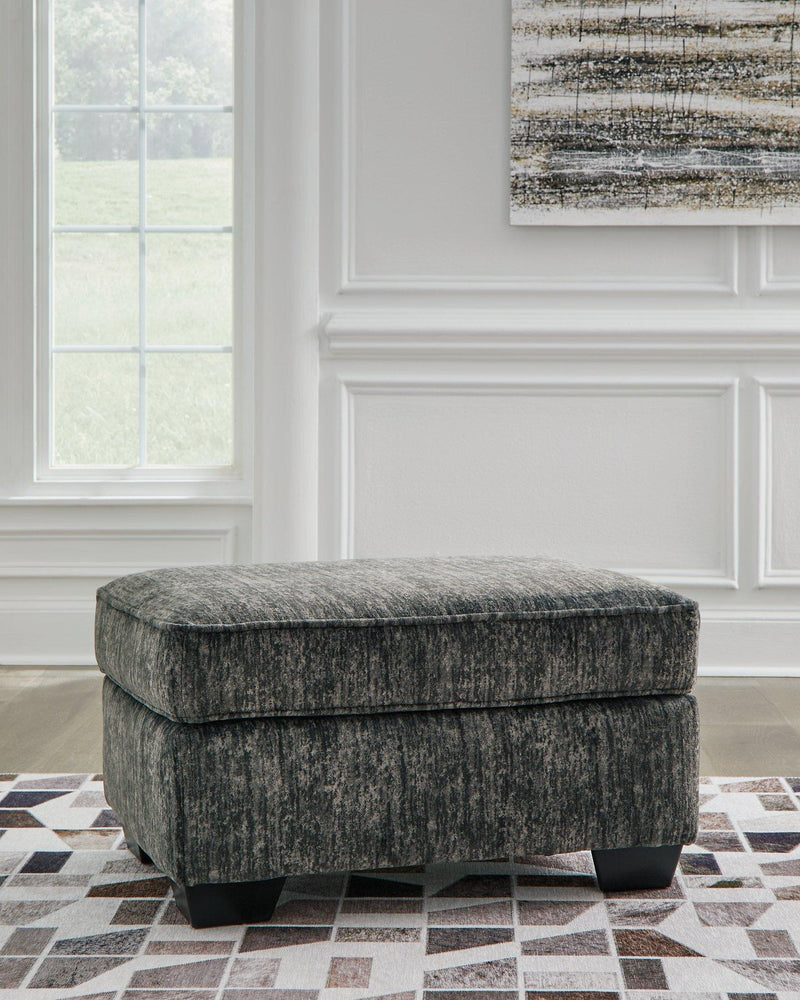 Ashley Furniture Lonoke living room set featuring a sofa and armchair with neutral fabric and modern design.