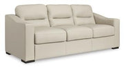 Ashley Furniture Treasure Trove sofa with plush cushions and modern design, shown in a cozy living room setting.