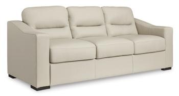 Ashley Furniture Treasure Trove sofa with plush cushions and modern design, shown in a cozy living room setting.