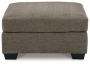 Ashley Furniture Mahoney living room set with sofa, loveseat, and armchair in a modern fabric design.