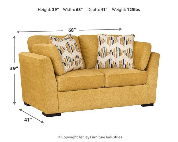 Ashley Furniture Keerwick living room set with matching sofa and armchair in a modern, stylish design.