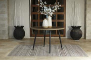 Outdoor dining set from Ashley Furniture featuring a table and chairs, perfect for outdoor gatherings and patio dining.