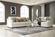 Ashley Furniture Heartcort Living Room Set featuring a sofa and chairs with plush upholstery and modern design.