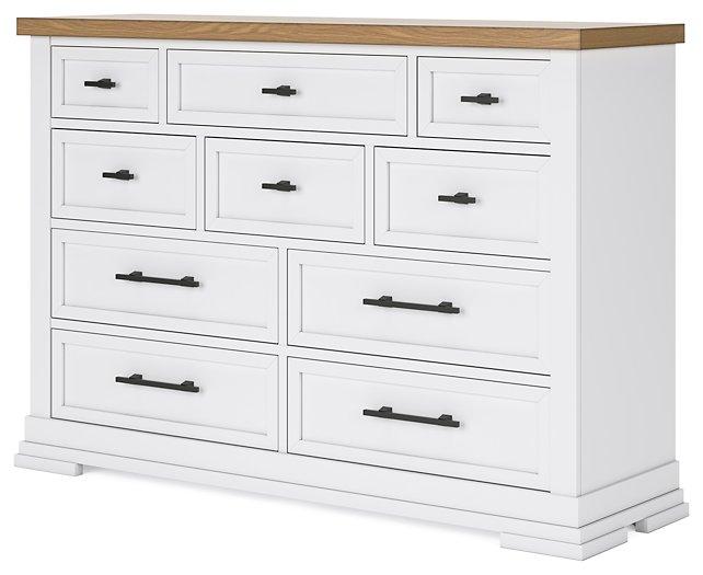 Ashley Furniture Ashbryn Dresser with multiple drawers and a sleek wood finish, ideal for modern bedroom storage.