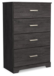 Ashley Furniture Belachime chest of drawers showing a wooden dresser with multiple drawers and sleek hardware.