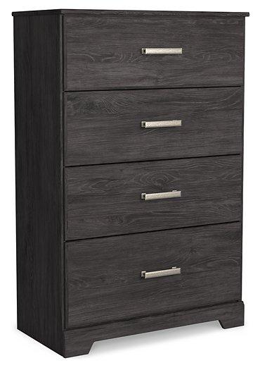 Ashley Furniture Belachime chest of drawers showing a wooden dresser with multiple drawers and sleek hardware.