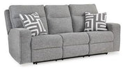 Ashley Furniture Biscoe Living Room Set featuring a sofa and armchair with neutral upholstery and contemporary design.