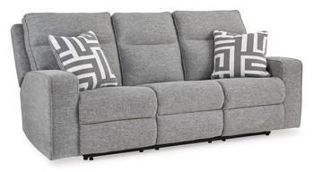 Ashley Furniture Biscoe Living Room Set featuring a sofa and armchair with neutral upholstery and contemporary design.