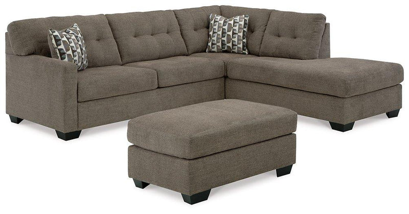 Ashley Furniture Mahoney living room set with sofa and chairs, featuring neutral upholstery and modern design for comfortable stylish living.