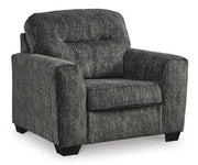 Ashley Furniture Lonoke Living Room Set with sofa and loveseat, featuring neutral fabric upholstery and modern design.
